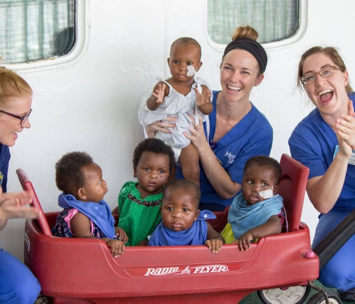 Ward nurses Jillian Dixon, Melissa Barre, and Tabitha Eckert on Deck 7 with several post-op palate patients.