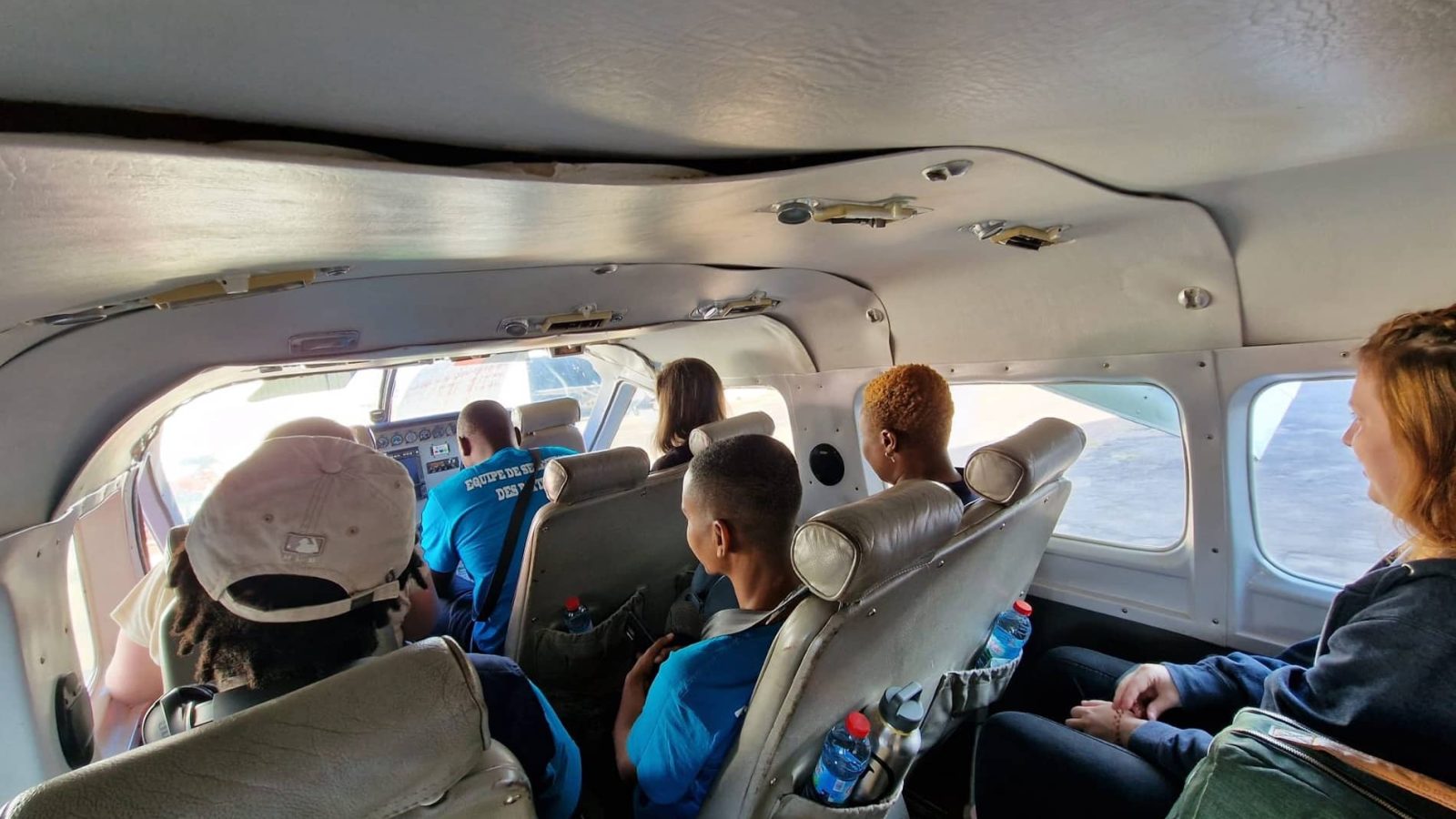 Mercy Ships Patient Selection Team on a MAF plane in Madagascar for field consultation to assess patients.